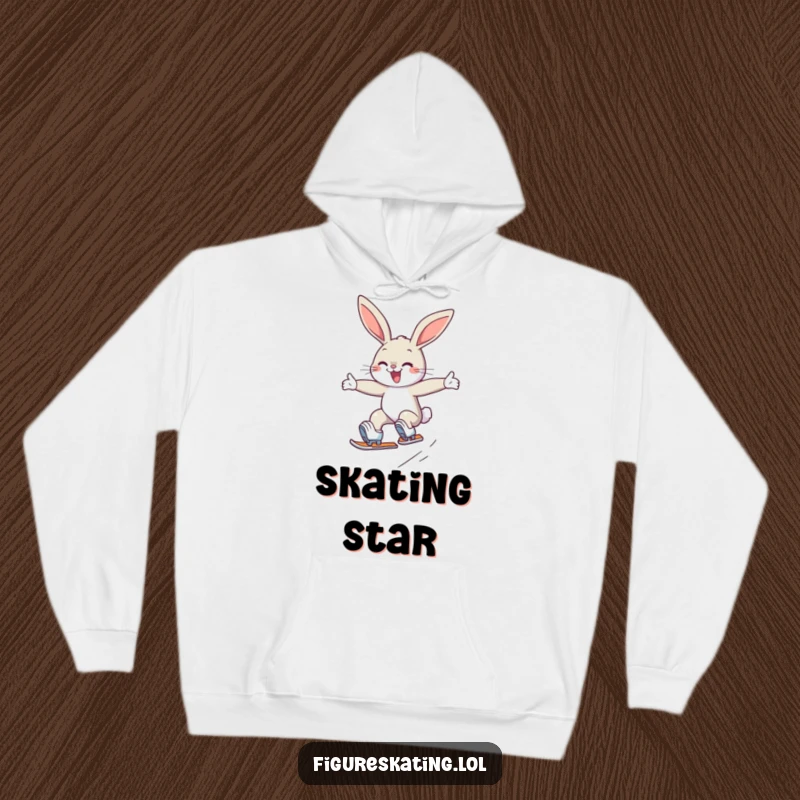 Funny hoodie showing a determined, smiling bunny executing a graceful jump on ice skates, perfect for chilly days.