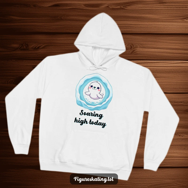 Funny seal ice ring hoodie showing a beaming seal executing a spectacular jump through an icy ring, radiating pure happiness.